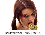 Woman eating kiwi - stock photo